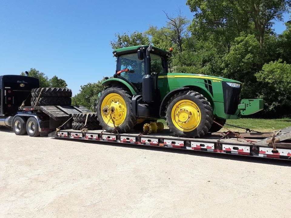 Lowboy Trailer Hauling Tractor