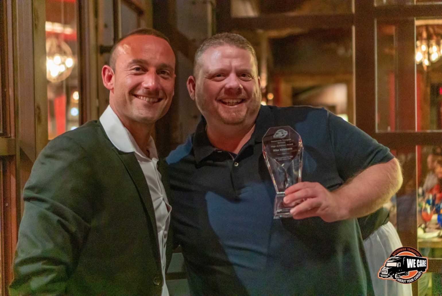Posing With An Award