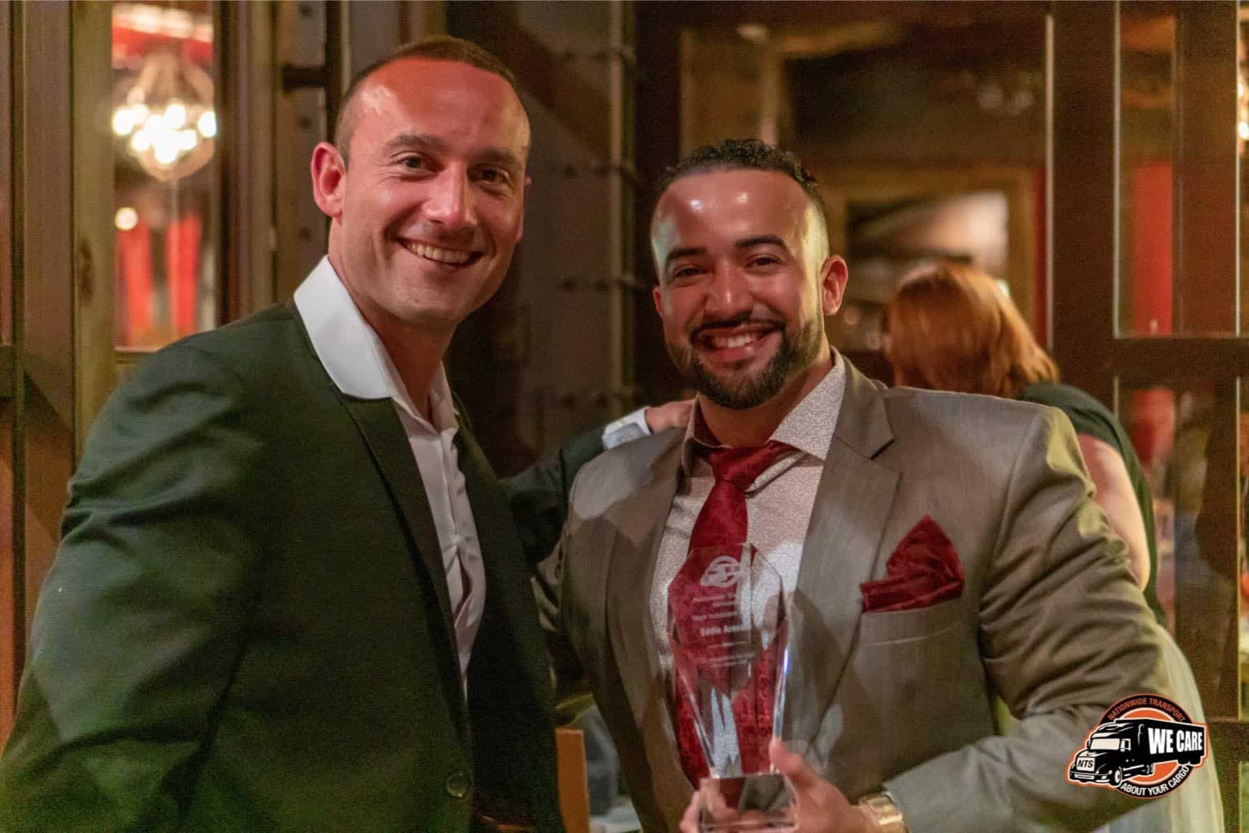 Smiling With An Award