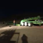 green trailer unloading