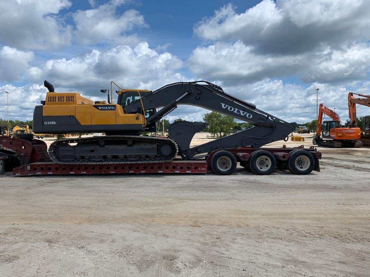 Hauling Volvo Backhoe