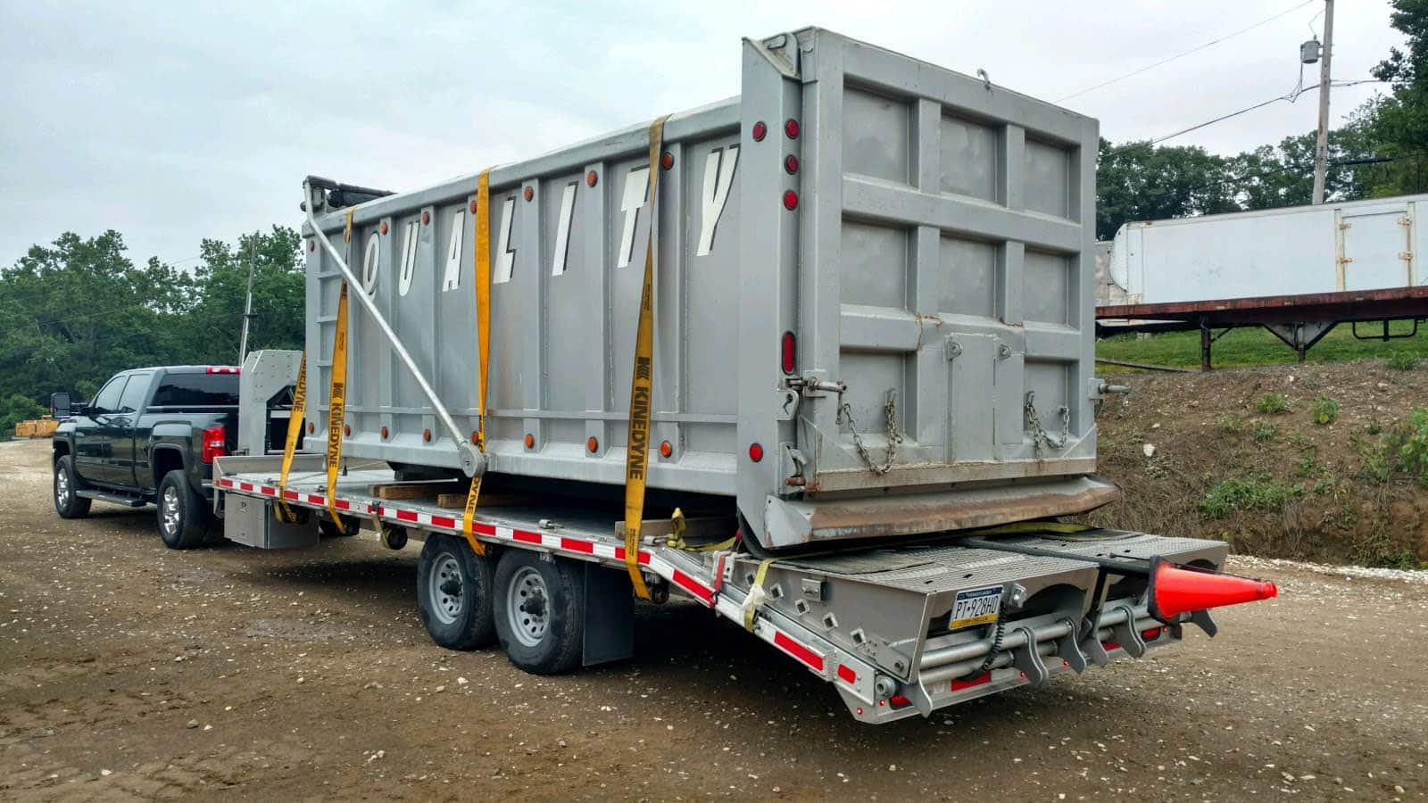 Truck hauling Container