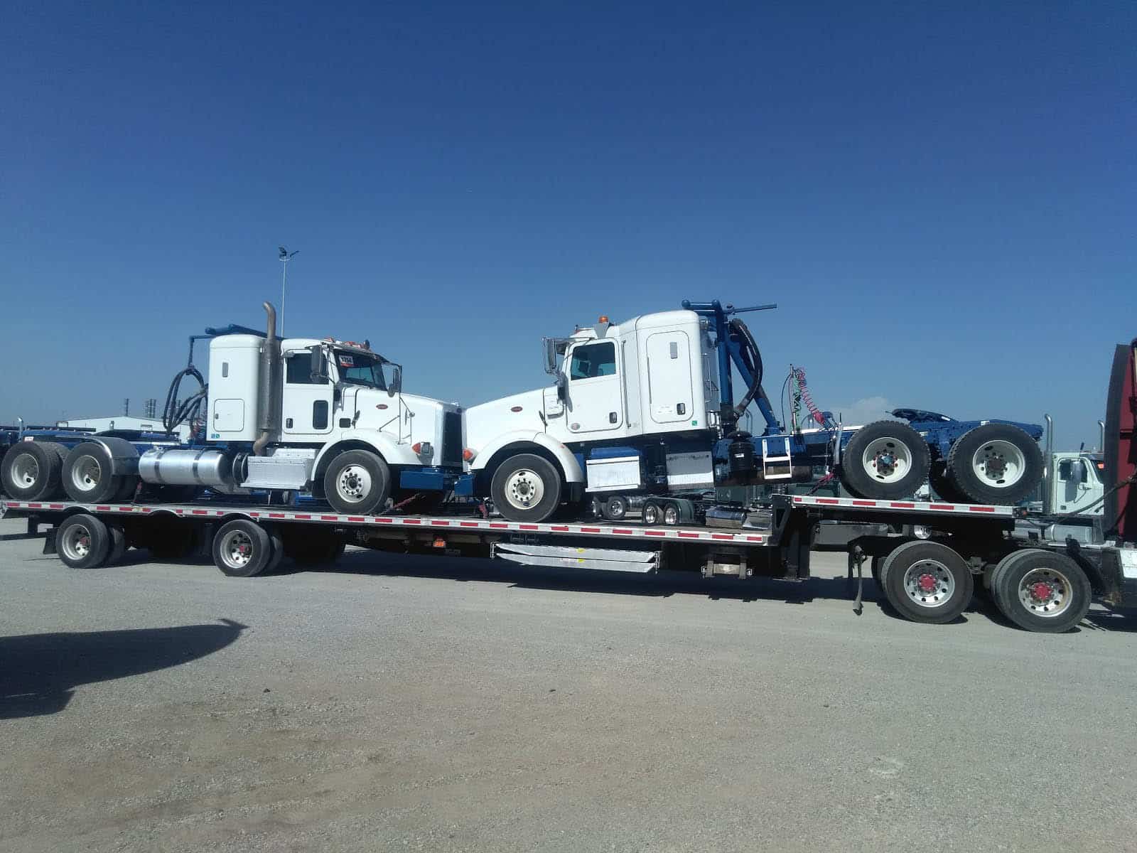 Lowboy Hauling Tractors