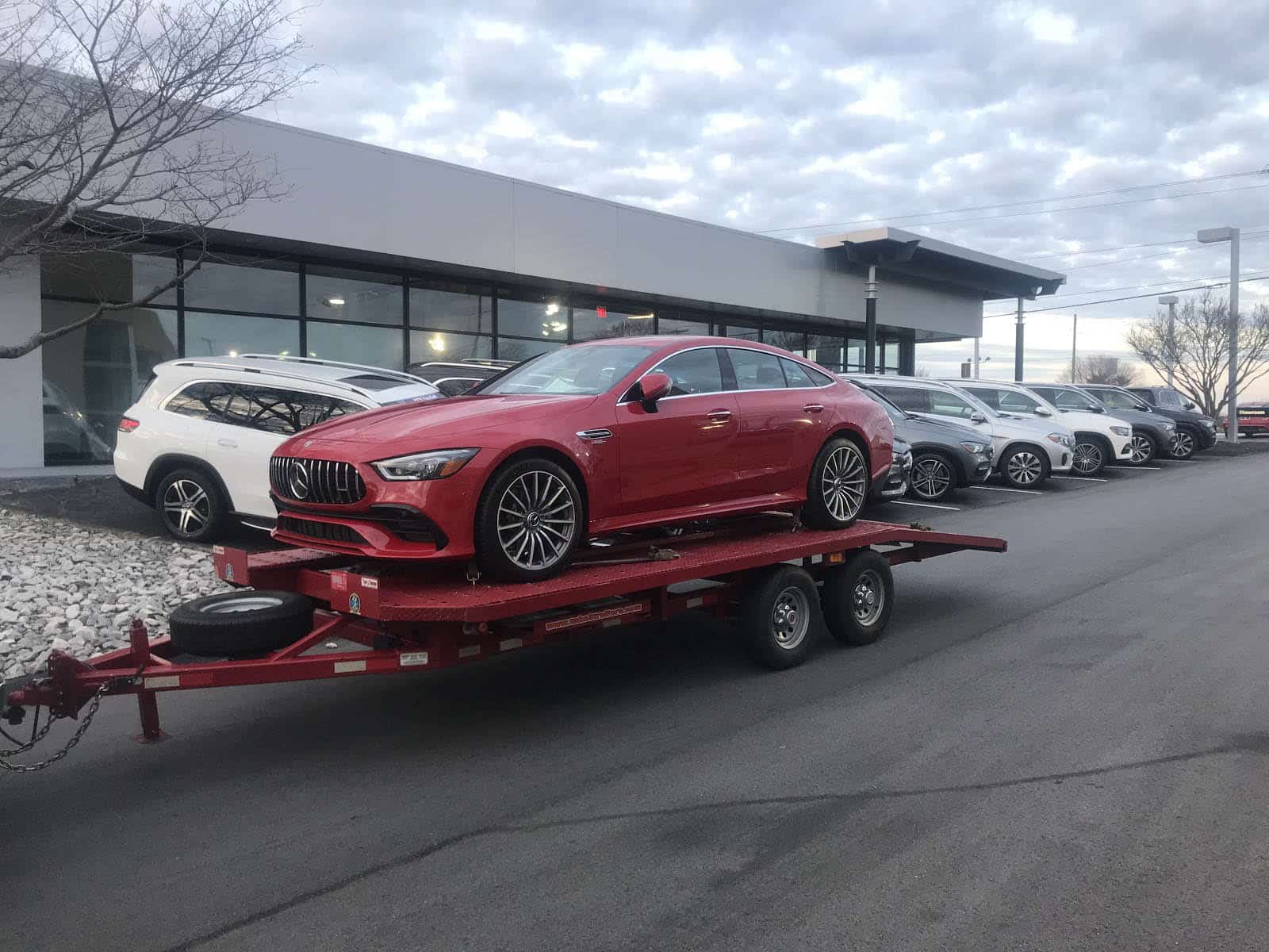 red car being towed