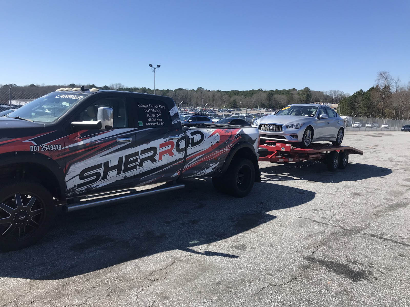Pickup Truck Hauling Car